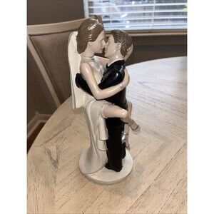 Contemporary Sexy Bride and Groom from the Paris Casino in Las Vegas Cake Topper